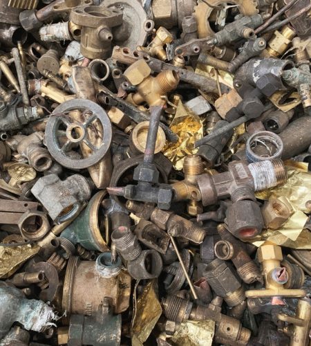 stock-photo-close-up-used-brass-scrap-are-non-ferrous-metal-raw-materials-for-the-recycling-smelting-1496745569-transformed